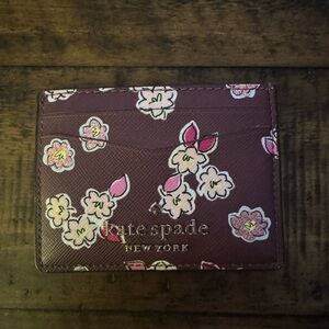 Kate Spade Floral leath card holder.